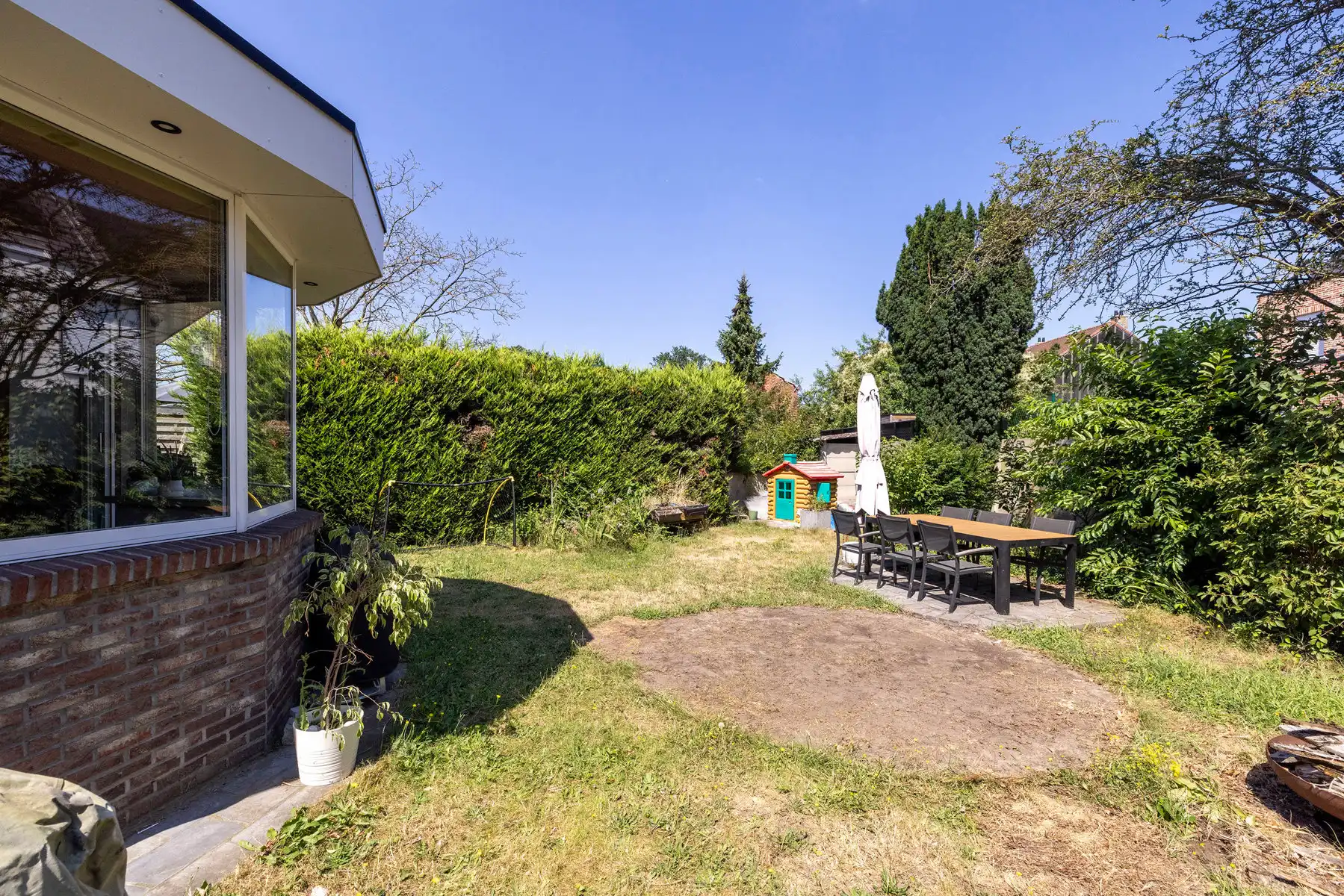 Ruime woning met 4 slpk, 2 bdk, garage en tuin!  foto 9