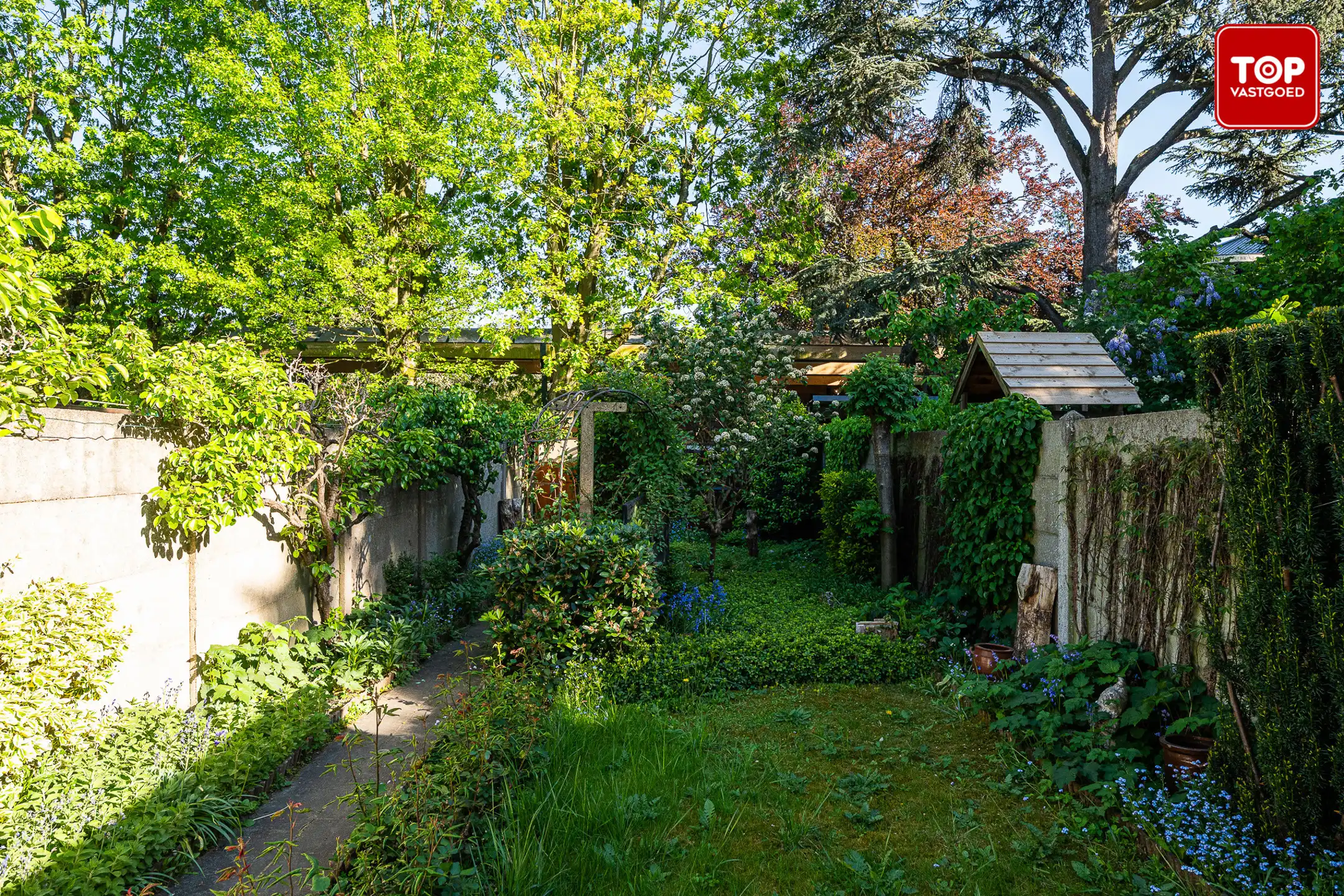 Instapklare woning met leuke tuin op gunstige locatie.  foto 24