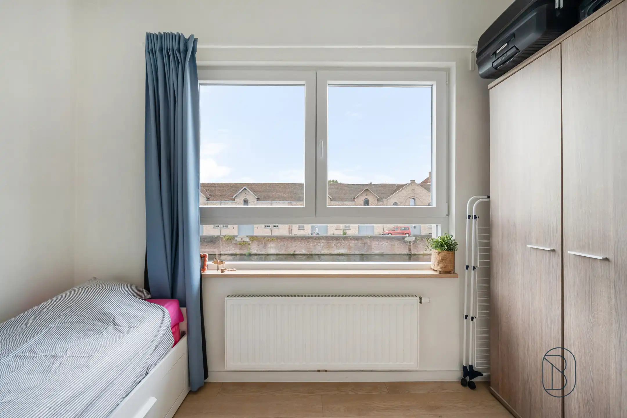 Instapklare woning met zonnige tuin in het hart van Kortrijk foto 16