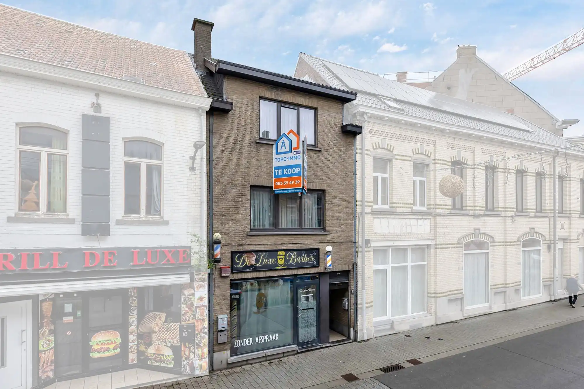 Interessant investeringspand met handelspand en appartement foto {{pictureIndex}}