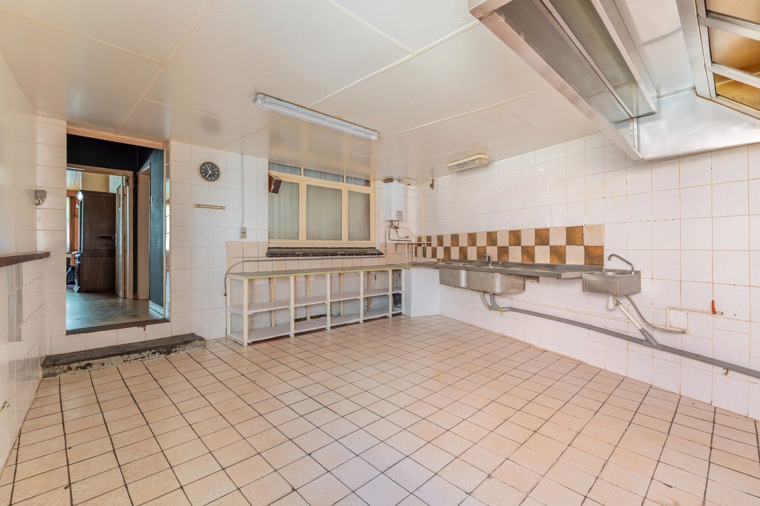 Karaktervol handelshuis met binnentuin in centrum Diepenbeek foto 9