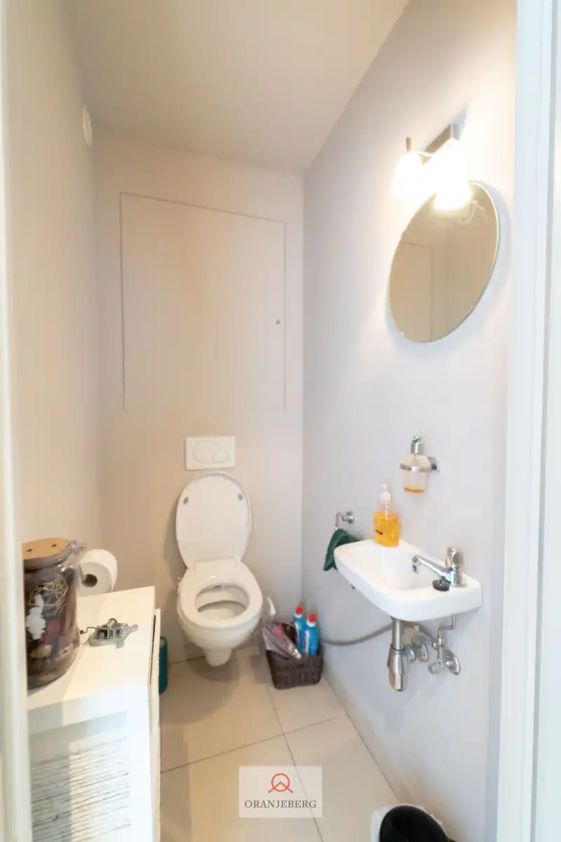 Gelijkvloers 3 slpk appartement met groot terras vlakbij Station foto 6