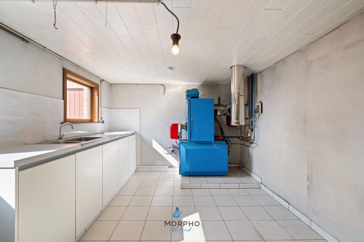 Te koop in Veldegem – Karaktervolle woning met veel potentieel op ruim perceel van 1.602 m² foto 11
