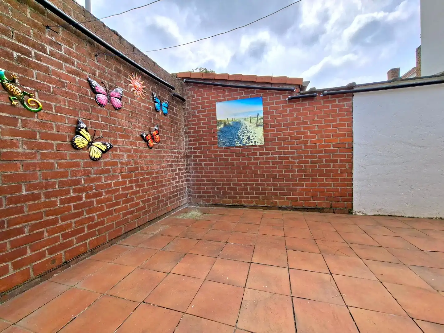 Toffe rijwoning met uitweg foto 2
