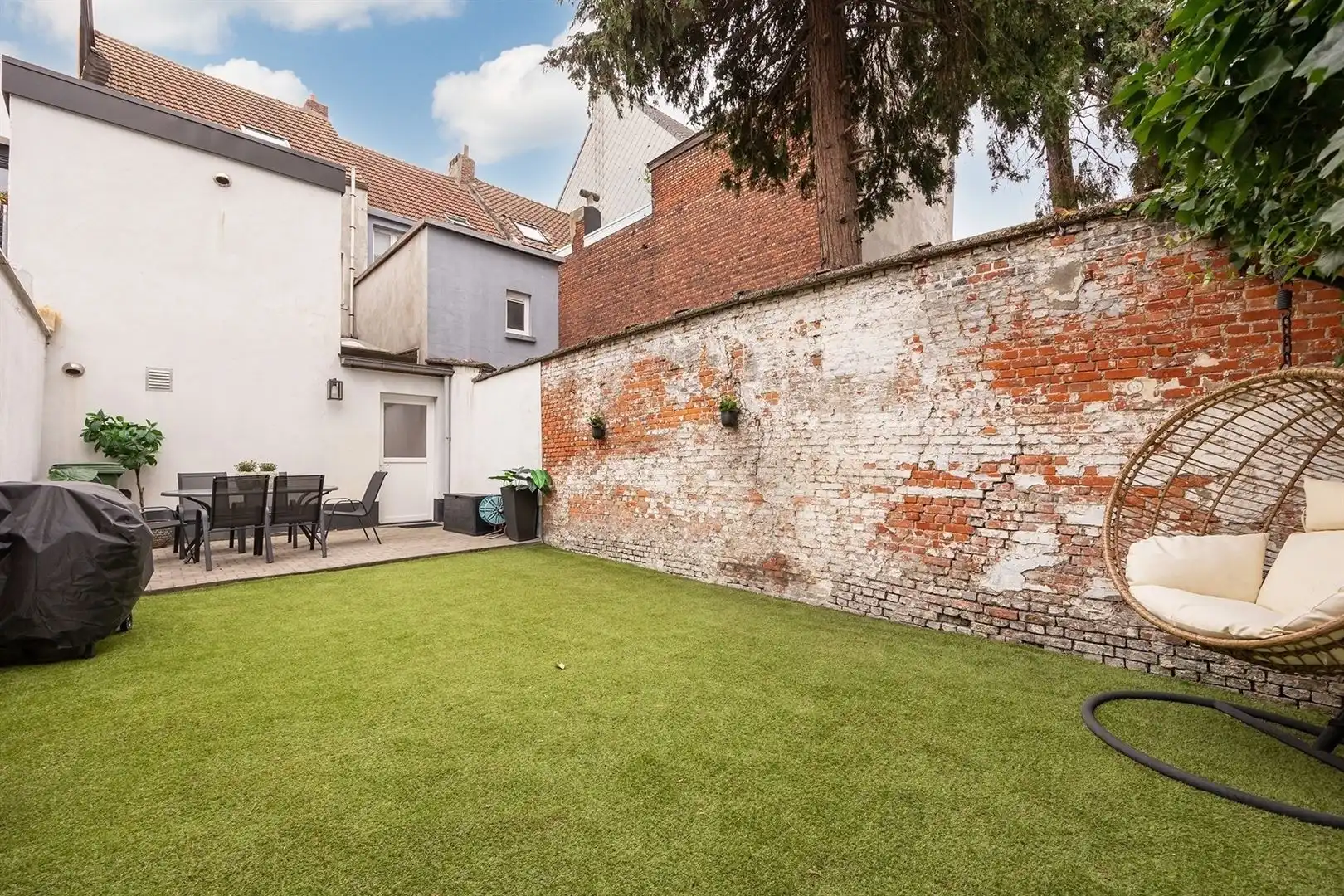 Stadswoning met privatieve tuin & garage foto 2