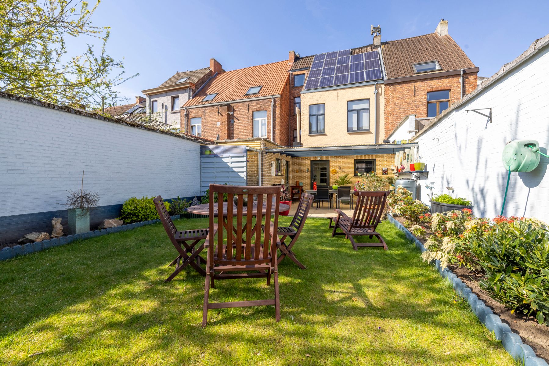 Ruime woning met 5 slpk, garage en zongerichte tuin te koop! foto 23