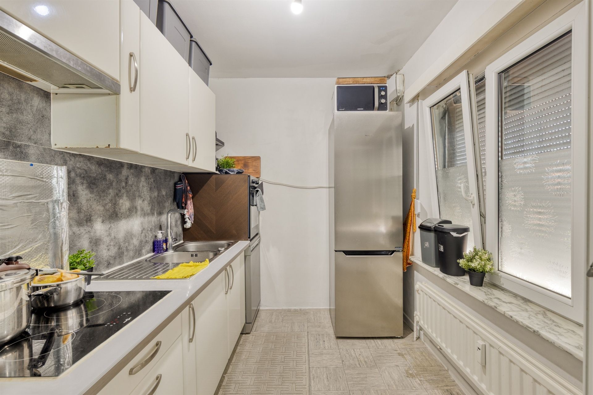 IN OPTIE !!! Opbrengsteigendom met 2 appartementen + 6 autostallingen foto 9