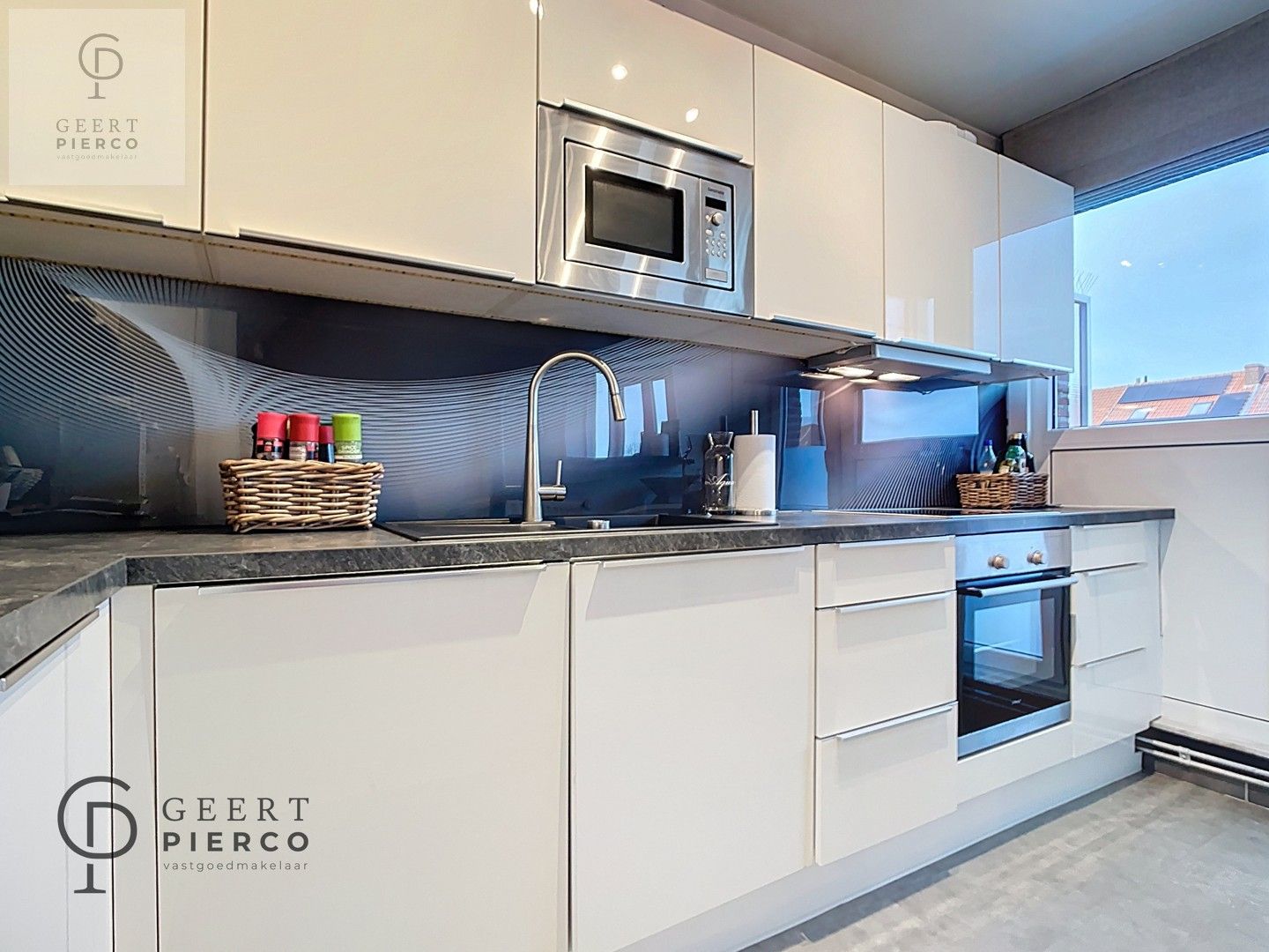 Gerenoveerd appartement met twee slaapkamers, ruim terras en ondergrondse staanplaats aan de stadsrand van Tienen. foto 7