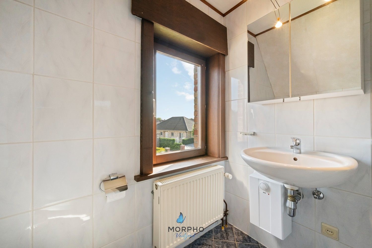 Te koop in Veldegem – Karaktervolle woning met veel potentieel op ruim perceel van 1.602 m² foto 16