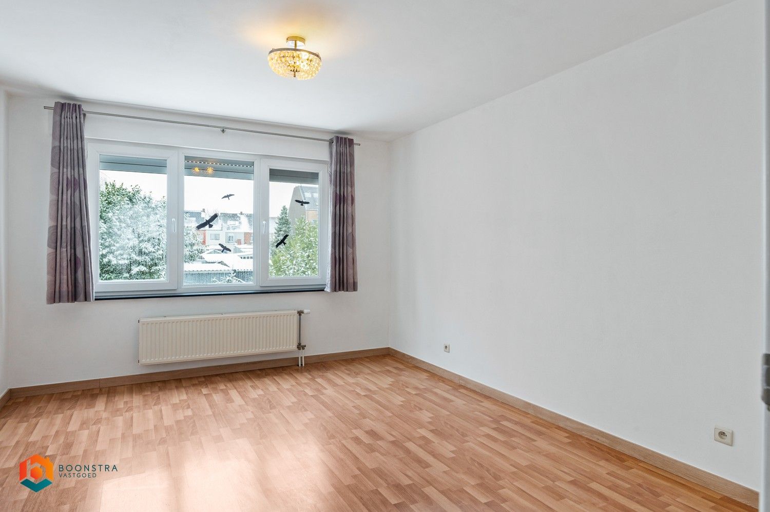 Instapklare rijwoning in centrum Heist foto 13