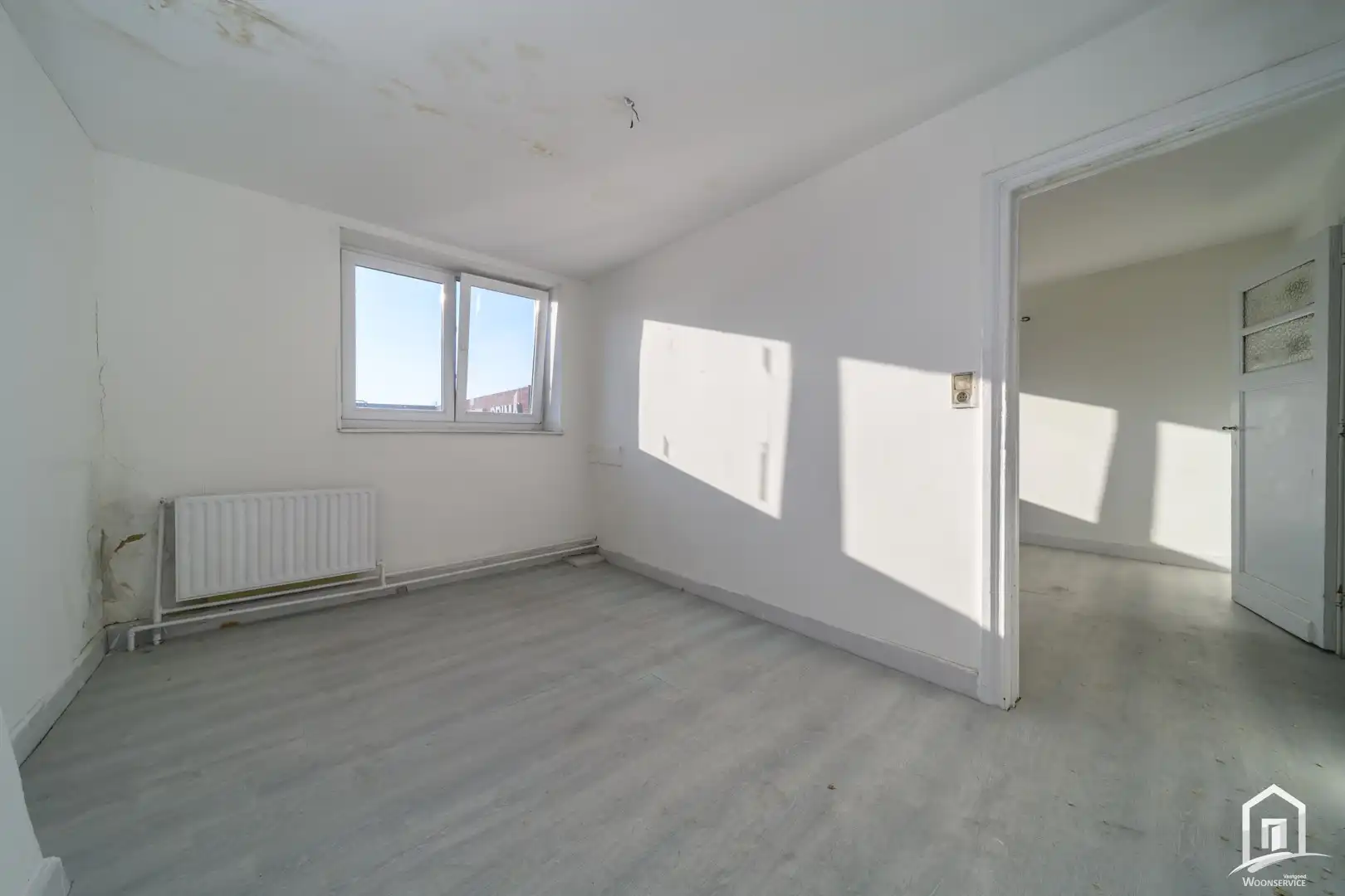 Totaal te renoveren gezinswoning te Erembodegem foto 9