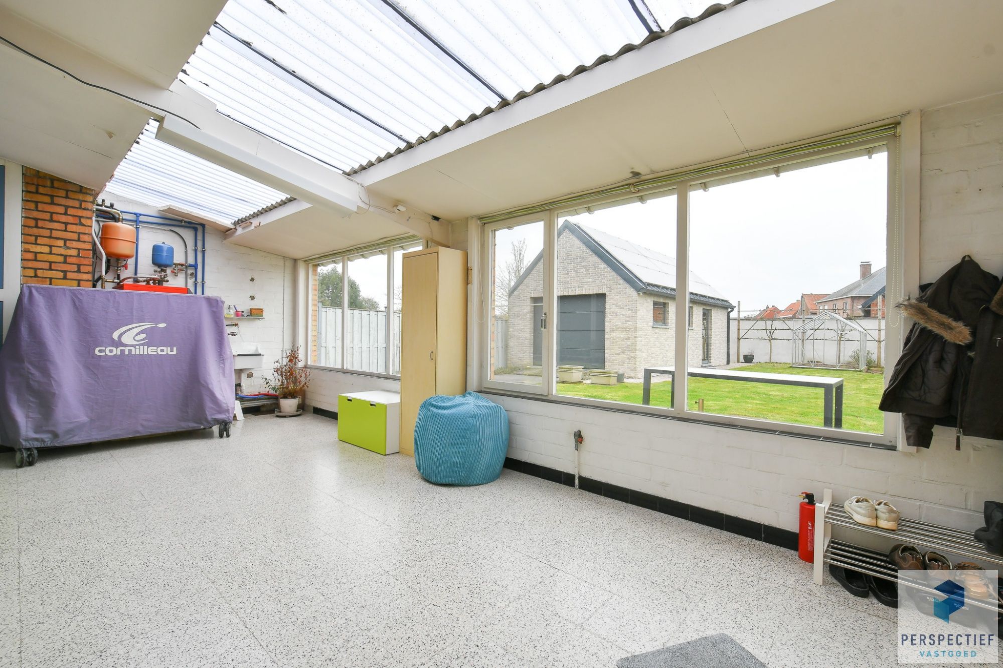 Rustig gelegen ruime halfopen woning met recent bijgebouw/garage op 454m² foto 8