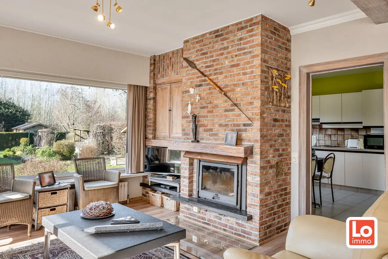 Degelijke open gelijkvloerse woning met inpandige garage en grote tuin op een groene toplocatie in Beervelde! foto 14