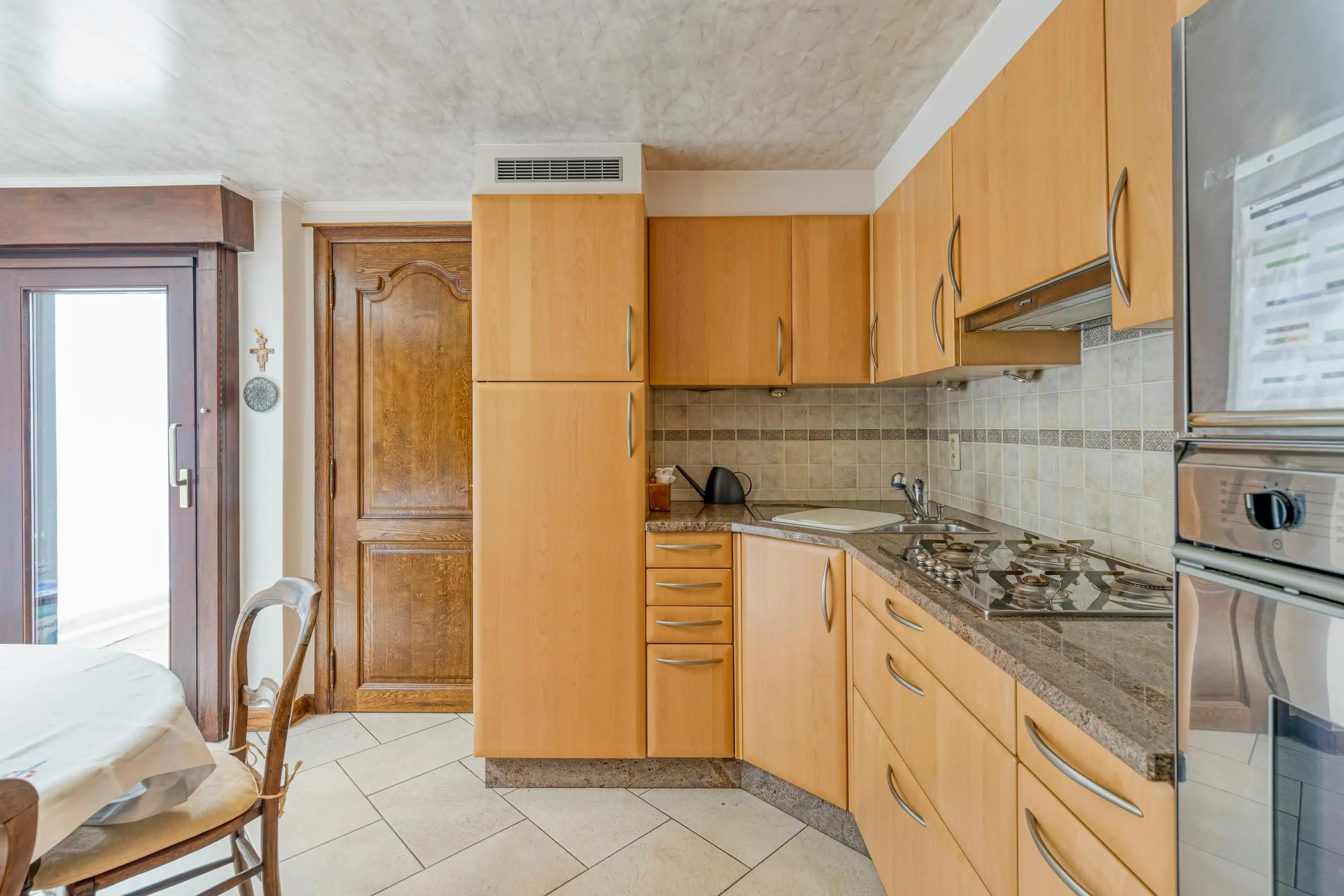 Huis te koop met veel mogelijkheden en tuin te Gentbrugge  foto 10