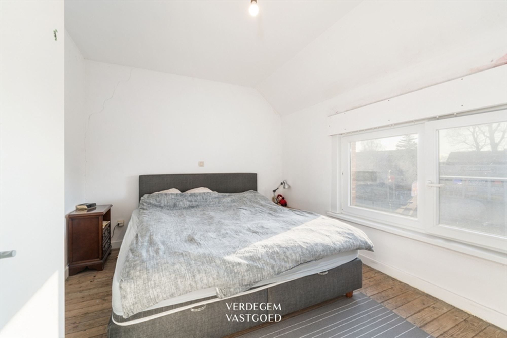 Centraal gelegen woning met 2 slaapkamers, garage en tuin foto 10