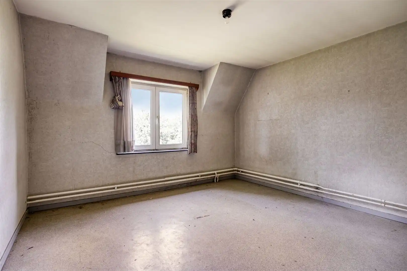 TE KOOP: Te renoveren woning met ruim perceel en projectmogelijkheden in Lummen! foto 16