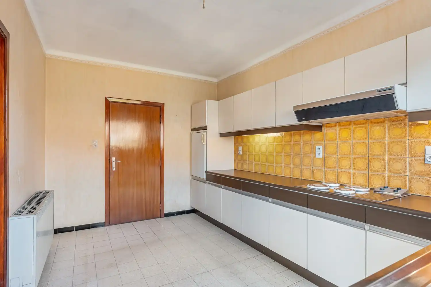 Goed gelegen en half open woning met 3 ruime slaapkamers, een extra leefruimte, een garage en een tuin te Kessel-Lo! foto 6