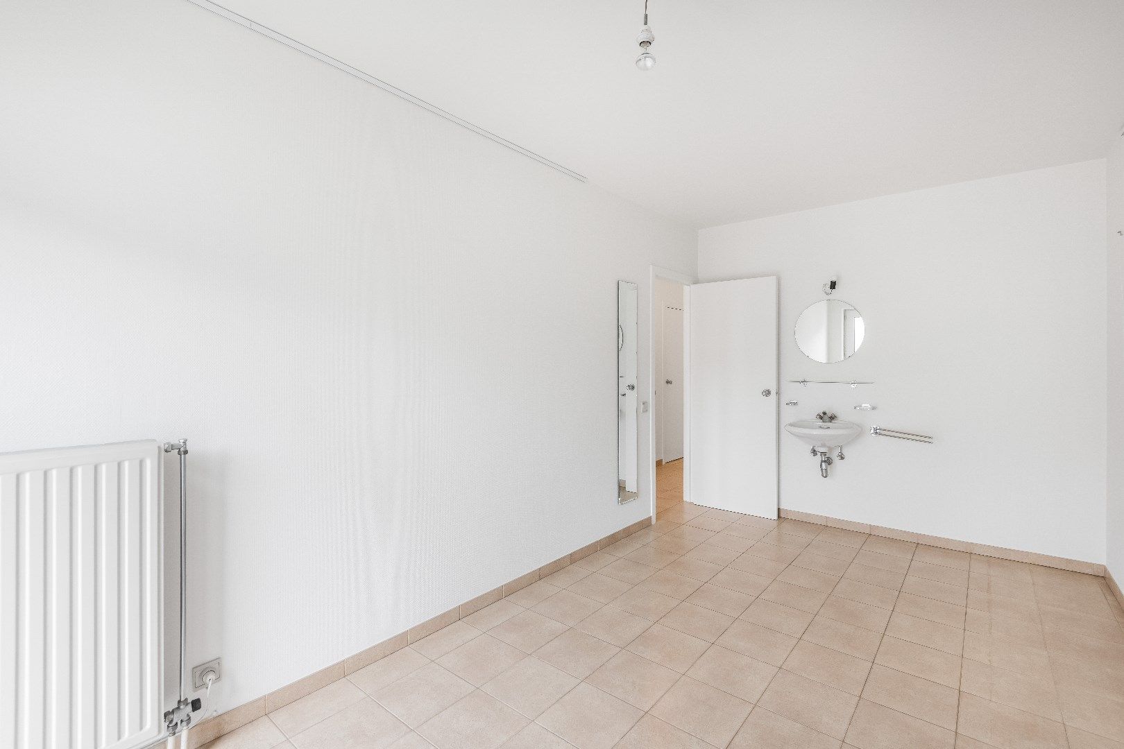 Zuid-west gericht twee slaapkamerappartment met open zicht en tandemgaragebox in de Koningslaan. foto 15