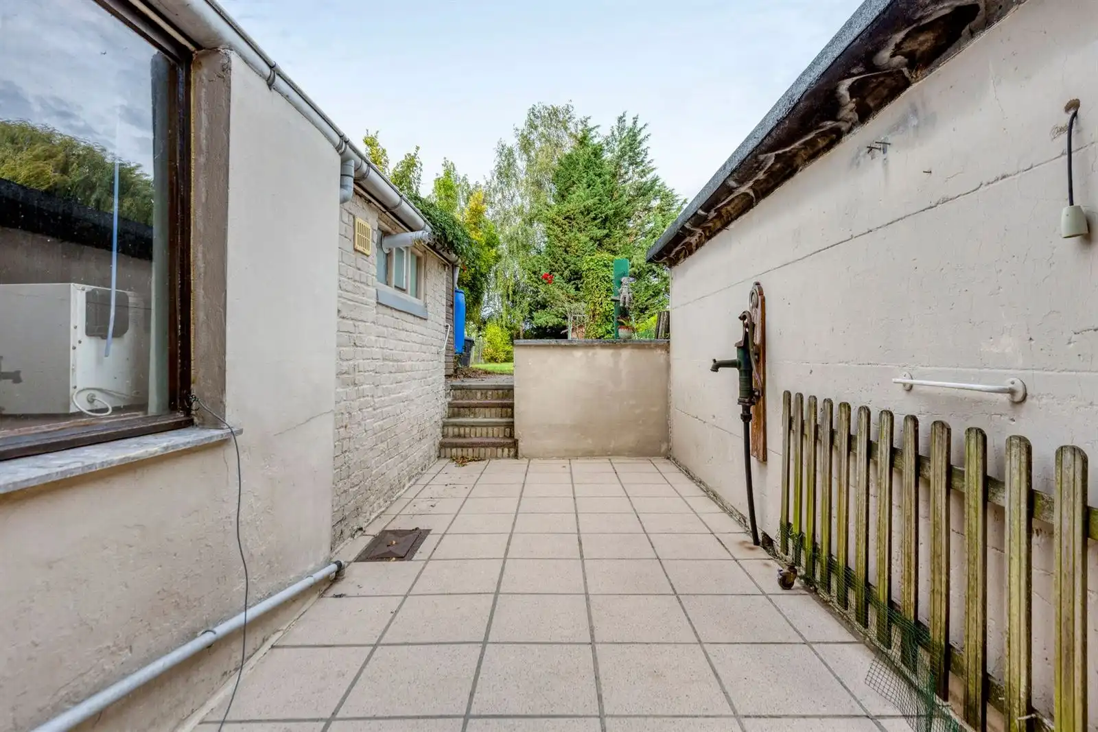 Te renoveren 3-gevelwoning met mogelijks 4 slaapkamers + garage foto 23