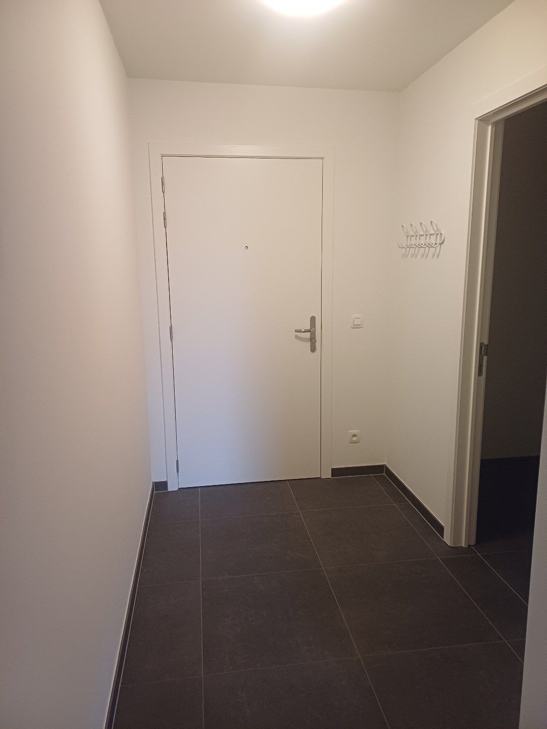 Instapklaar gelijkvloers appartement in Peer centrum met ruim terras + tuintje. foto 8