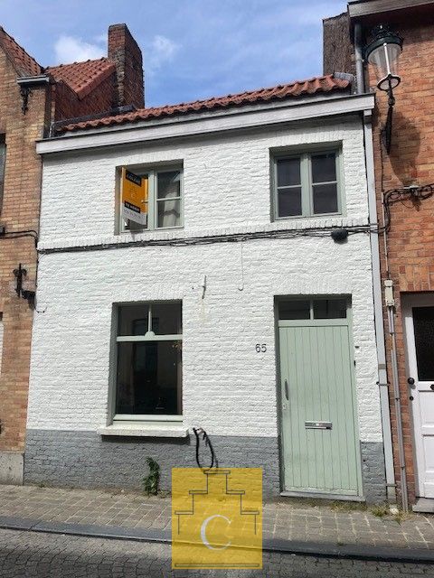 Toffe Brugse woning met groot terras – ideale ligging in rustige straat - foto 1