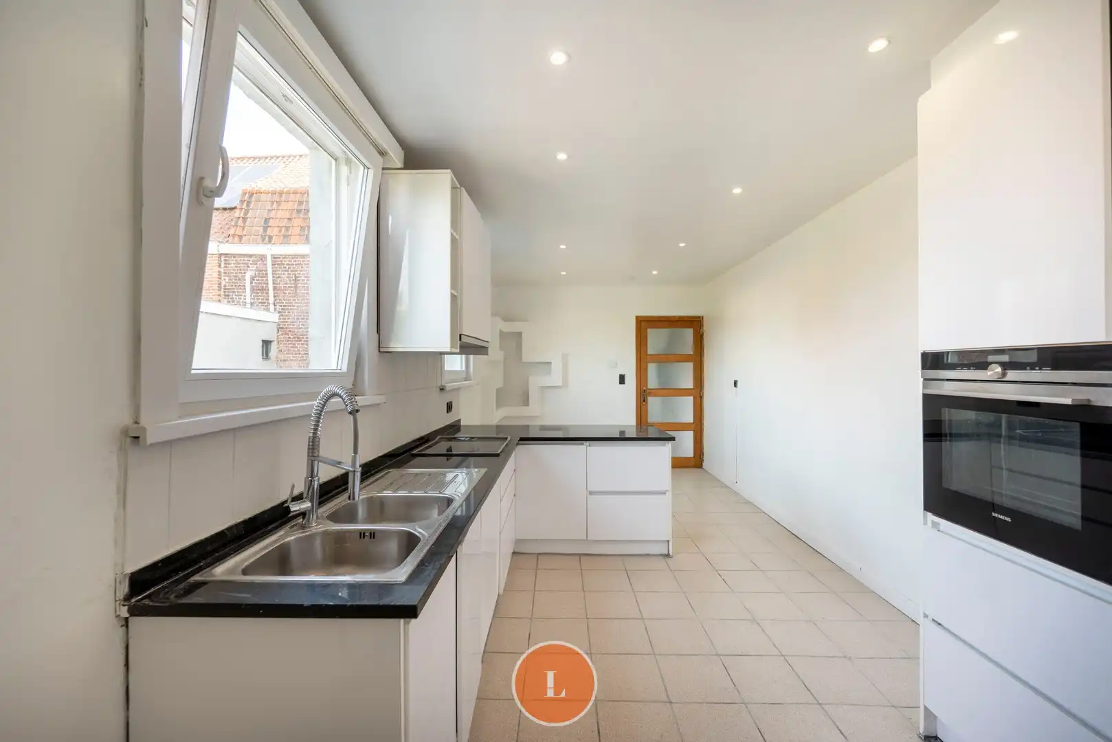 Huis met 4 slaapkamers te koop in centrum Menen foto 12