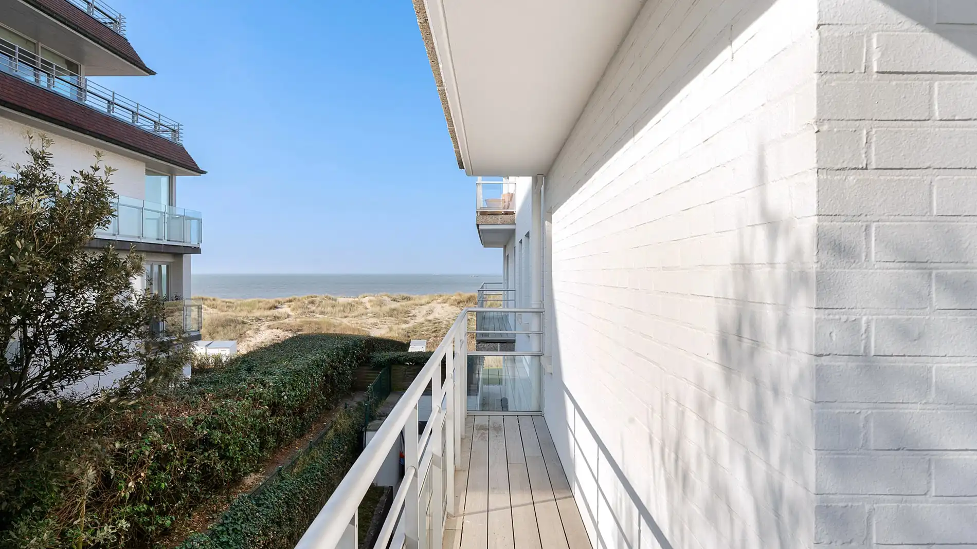 Uitzonderlijk hoekappartement met adembenemend zee-en duinenzicht langs de Wandeldijk in het Zoute foto 30