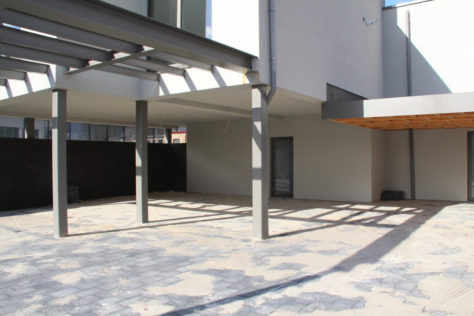 RUIM APPARTEMENT VAN 120 M² MET TERRAS, LIFT, 2 SLAAPKAMERS EN AUTOSTANDPLAATS GELEGEN TE CENTRUM KERMT foto 16