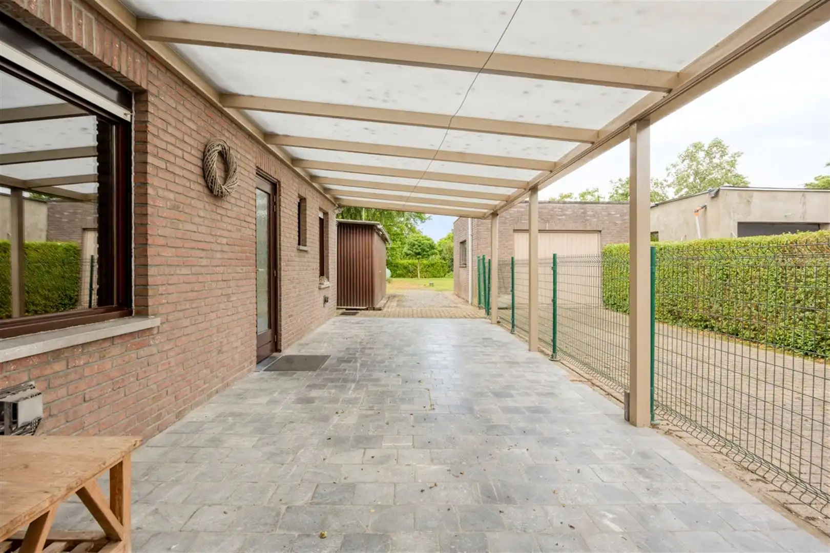 Rustig gelegen, op te frissen halfopen bebouwing met 3 slaapkamers op een perceel van 672 m². foto 17