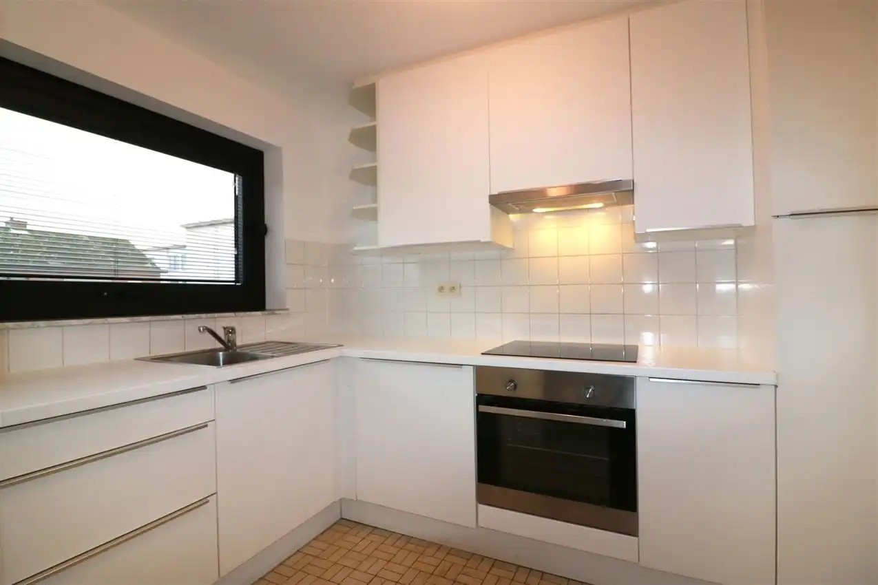 Appartement met 2 slpk, terras, tuin en autostaanplaats foto 8