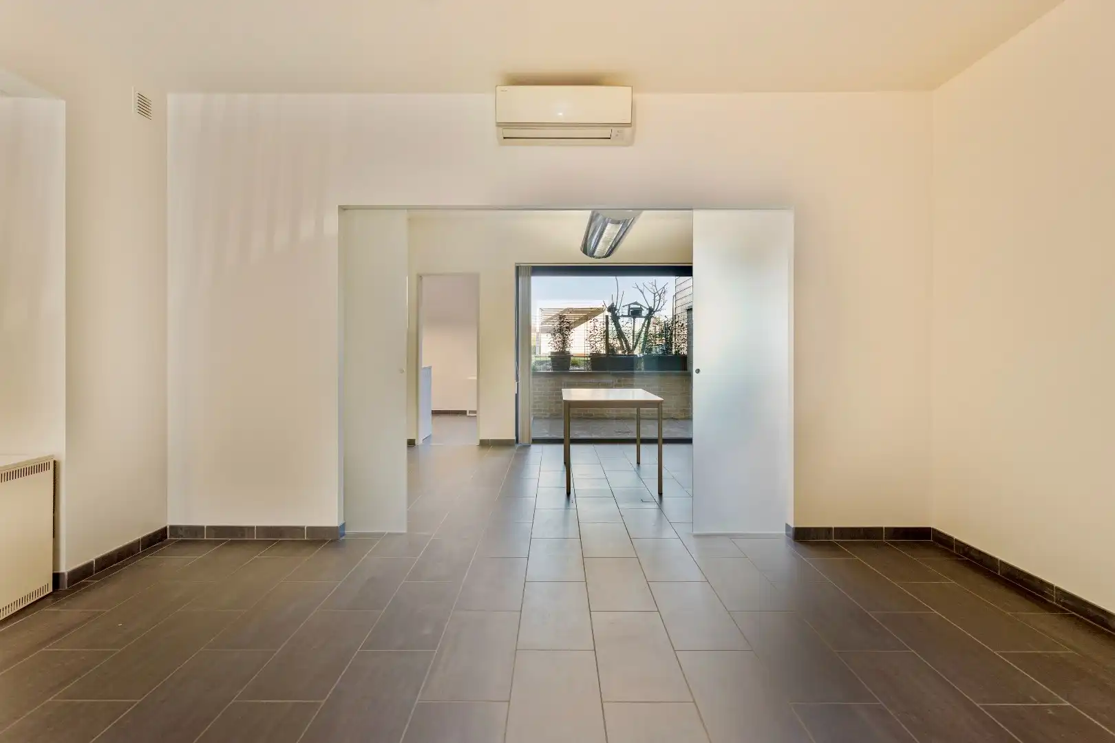 Energiezuinig en instapklaar gelijkvloersappartement met private koer foto 9