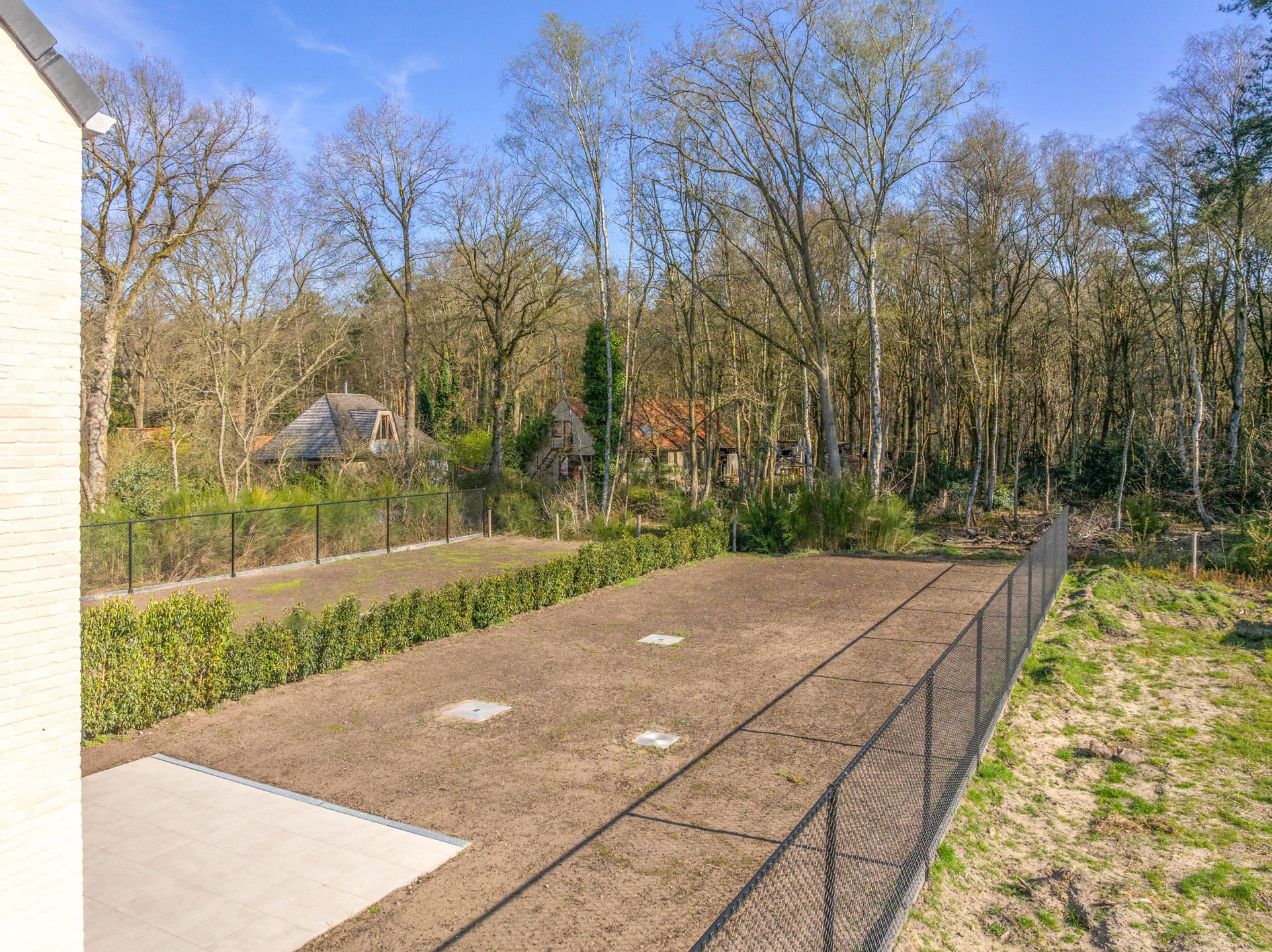 Stijlvolle nieuwbouwkoppelwoning met adembenemend boszicht foto 17