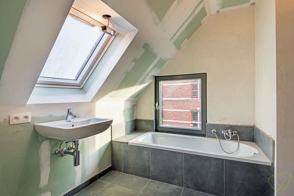 Uitzonderlijk en volledig vernieuwd duplex-appartement gelegen op de Markt van Eeklo! foto 13