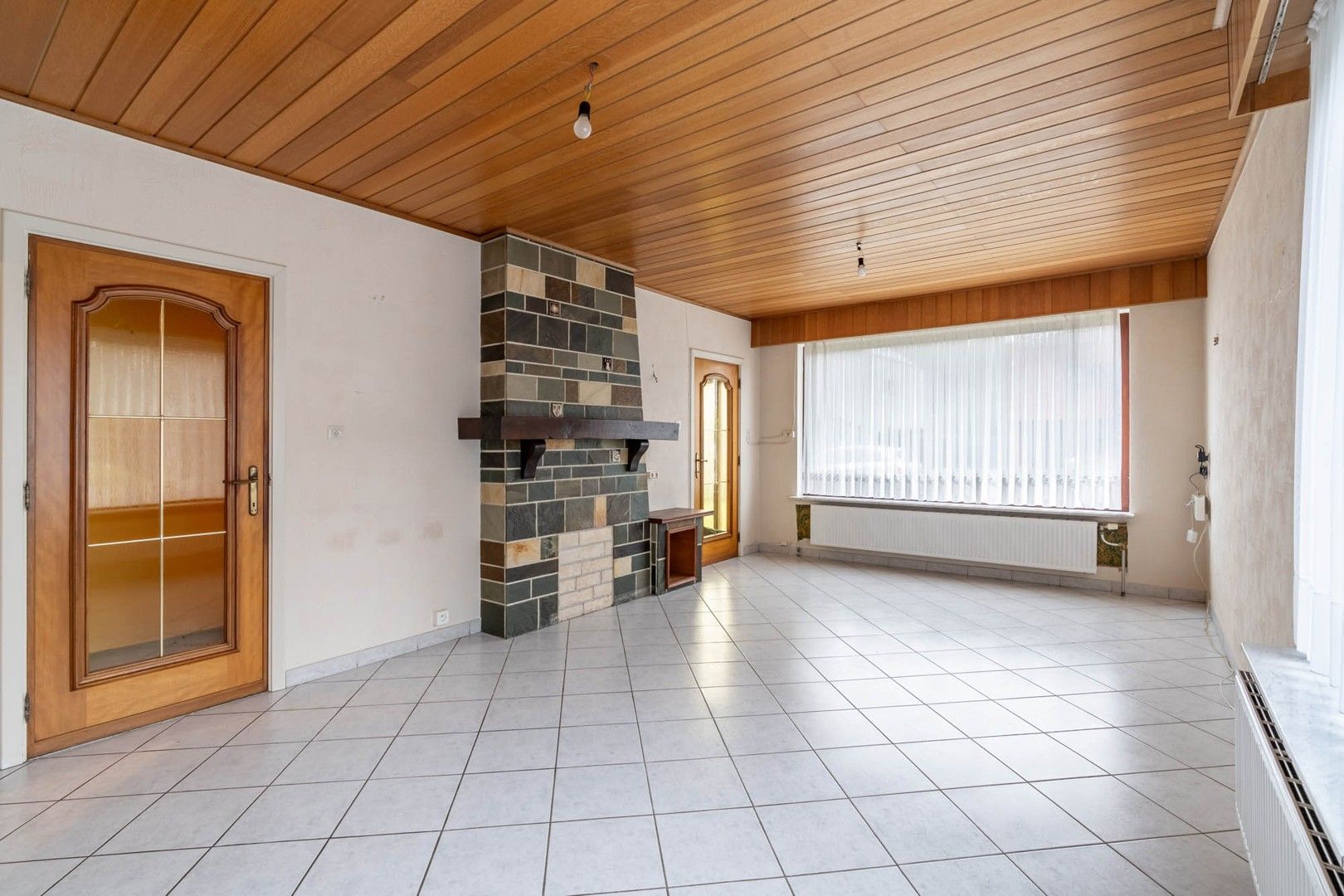 Te Koop: Te Renoveren Woning op een Perceel van 714m² in Groene Omgeving te Houthalen foto 3