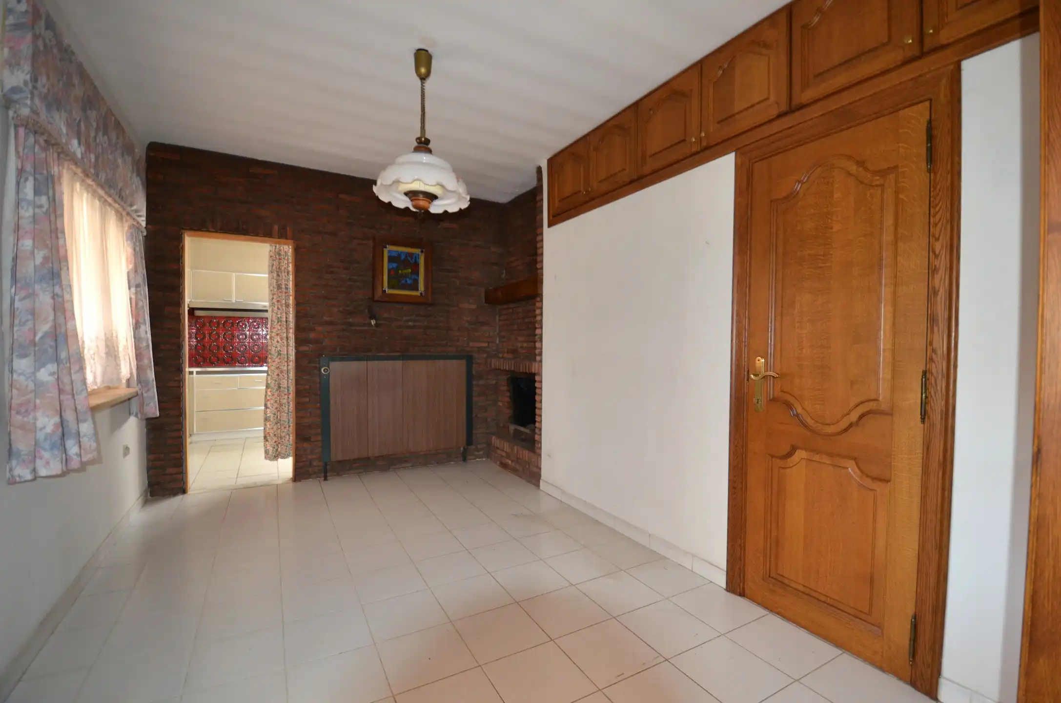 Goed gelegen, te renoveren halfopen bebouwing foto 10