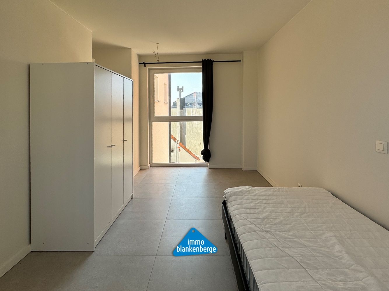 Zeer ruim triplex appartement met huislift, vlak bij de Zeedijk van Blankenberge foto 15