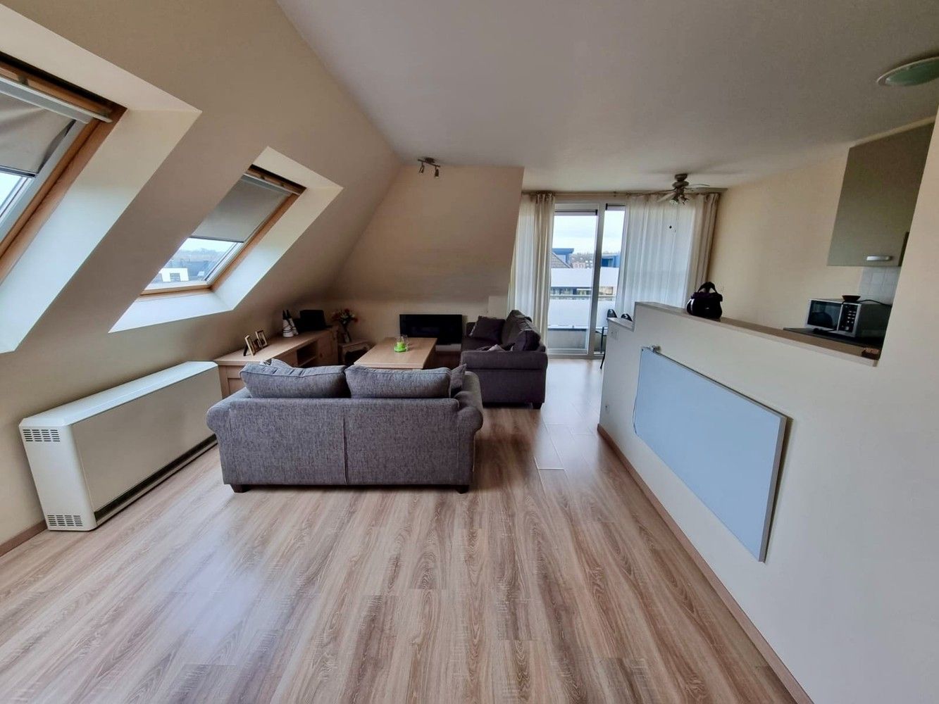 Gezellig appartement met 2 slaapkamers en garage! foto 4