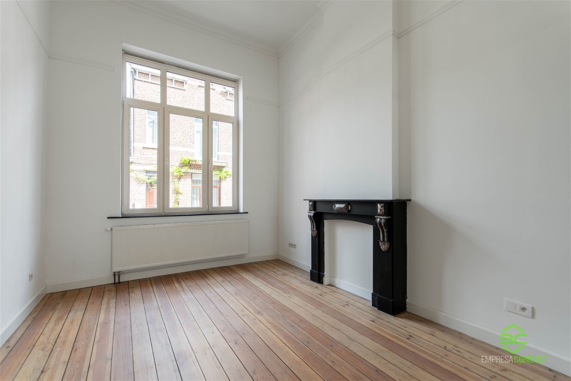 Karaktervolle gezinswoning met 3 slpk en stadstuin, in het centrum! foto 3