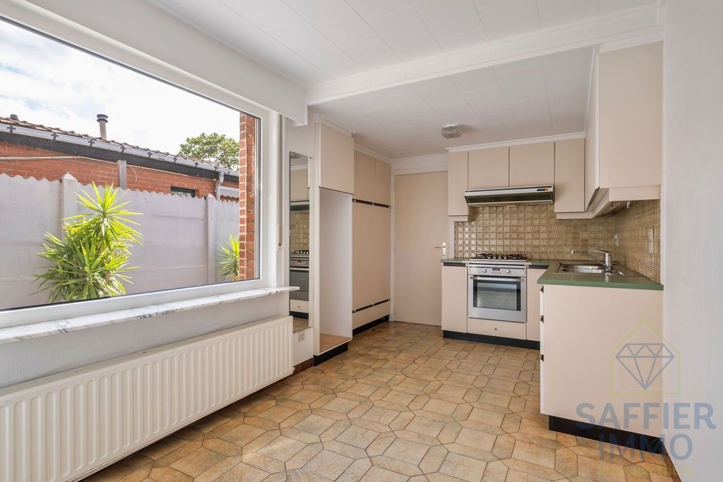 Ruime woning met tuin en uitweg in het hart van Ingelmunster foto 18