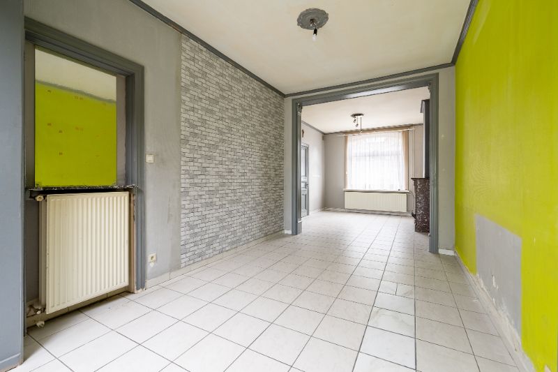 Ruime en veelzijdige rijwoning met garage achteraan en aparte ingang foto 6