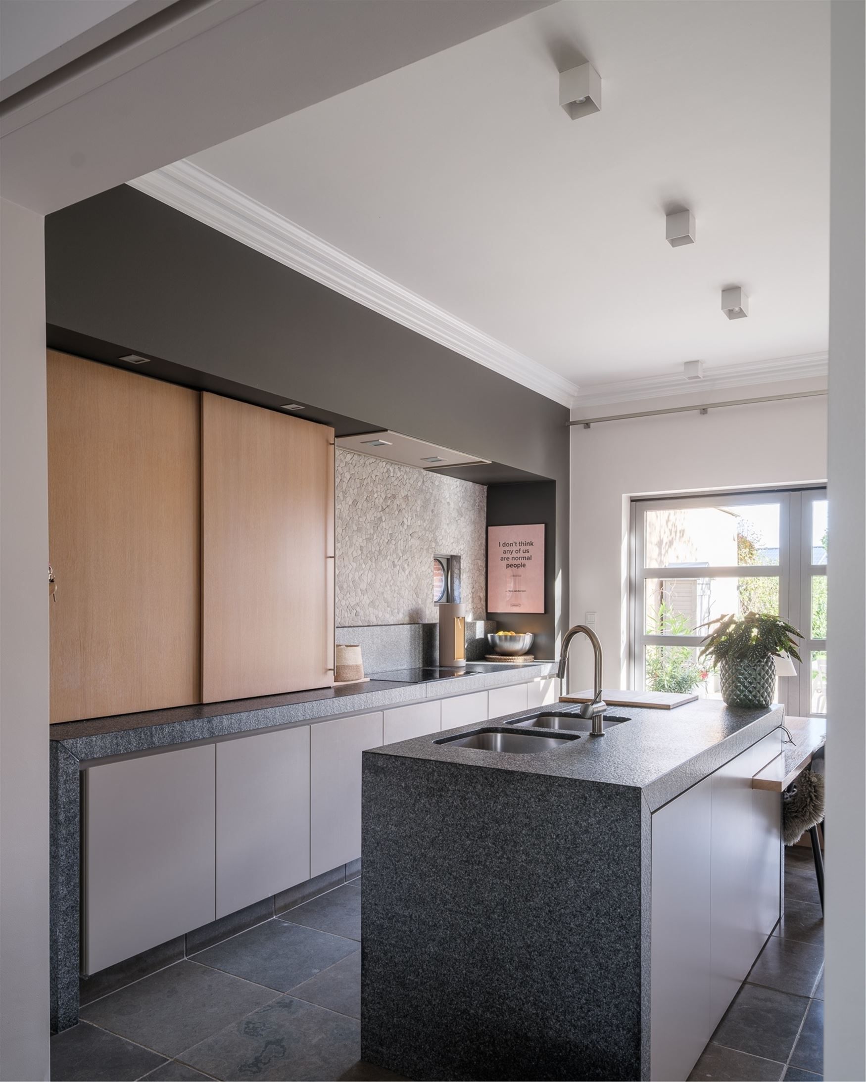 Hoogwaardig afgewerkte herenwoning met zicht op groen en volledige privacy in het hart van Bottelare. foto 27