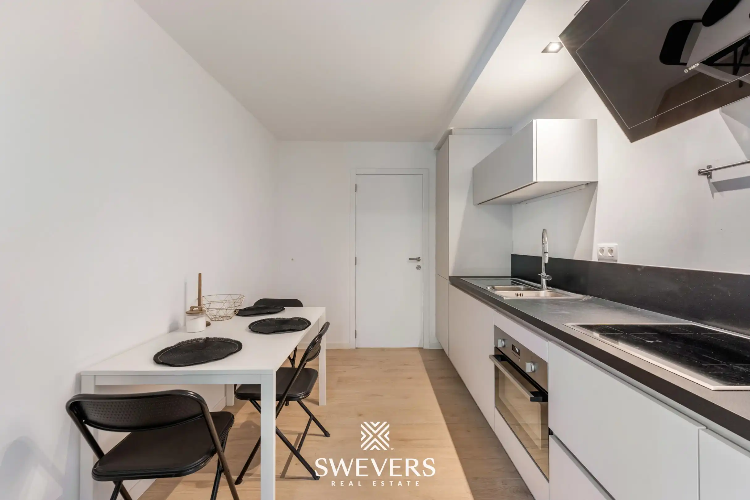 Modern en instapklaar appartement in hartje Genk met uitstekende investeringsopportuniteit foto 8