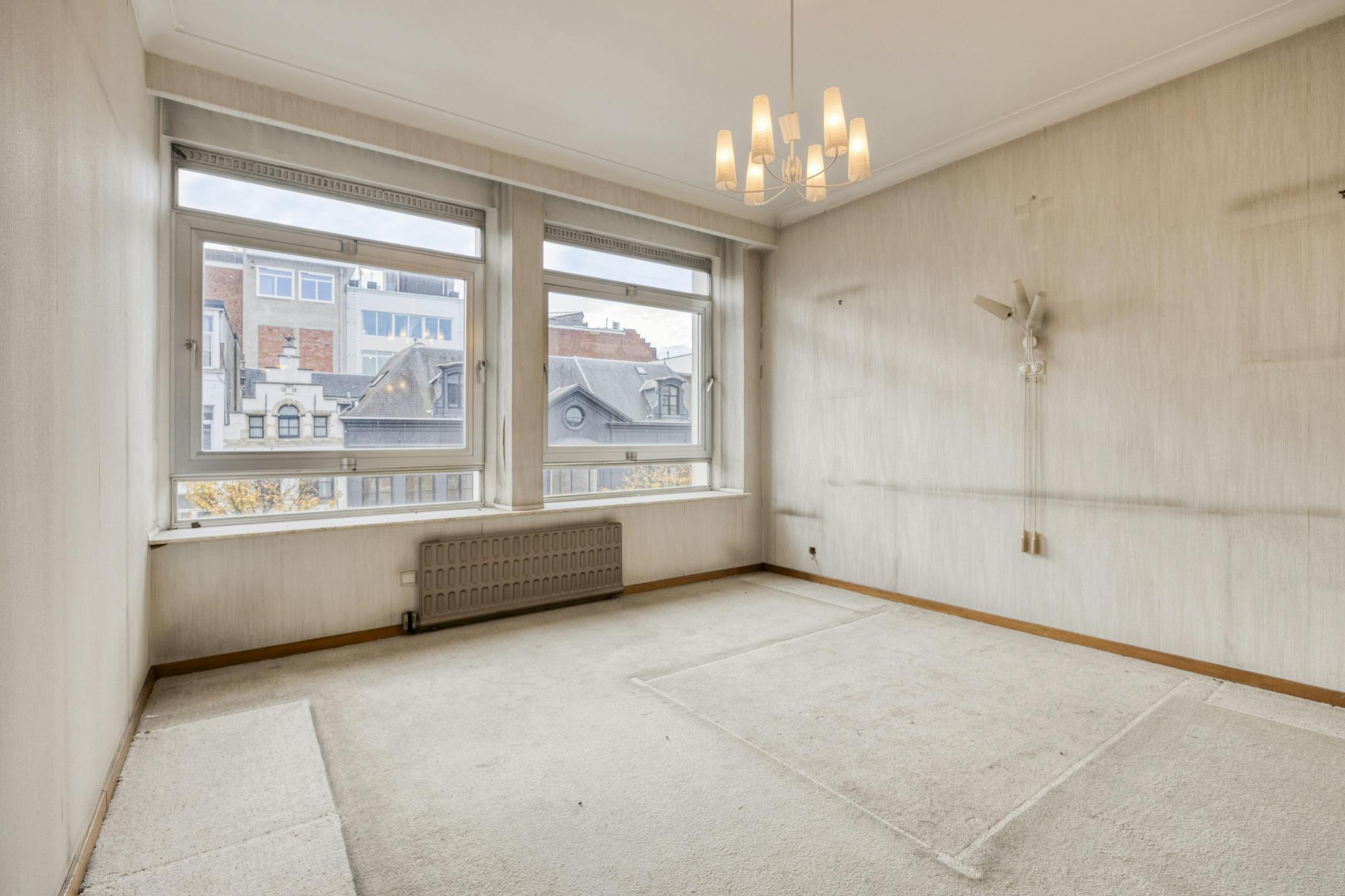 Te renoveren opbrengsteigendom met 3 appartementen en handelspand in Antwerpen foto 55