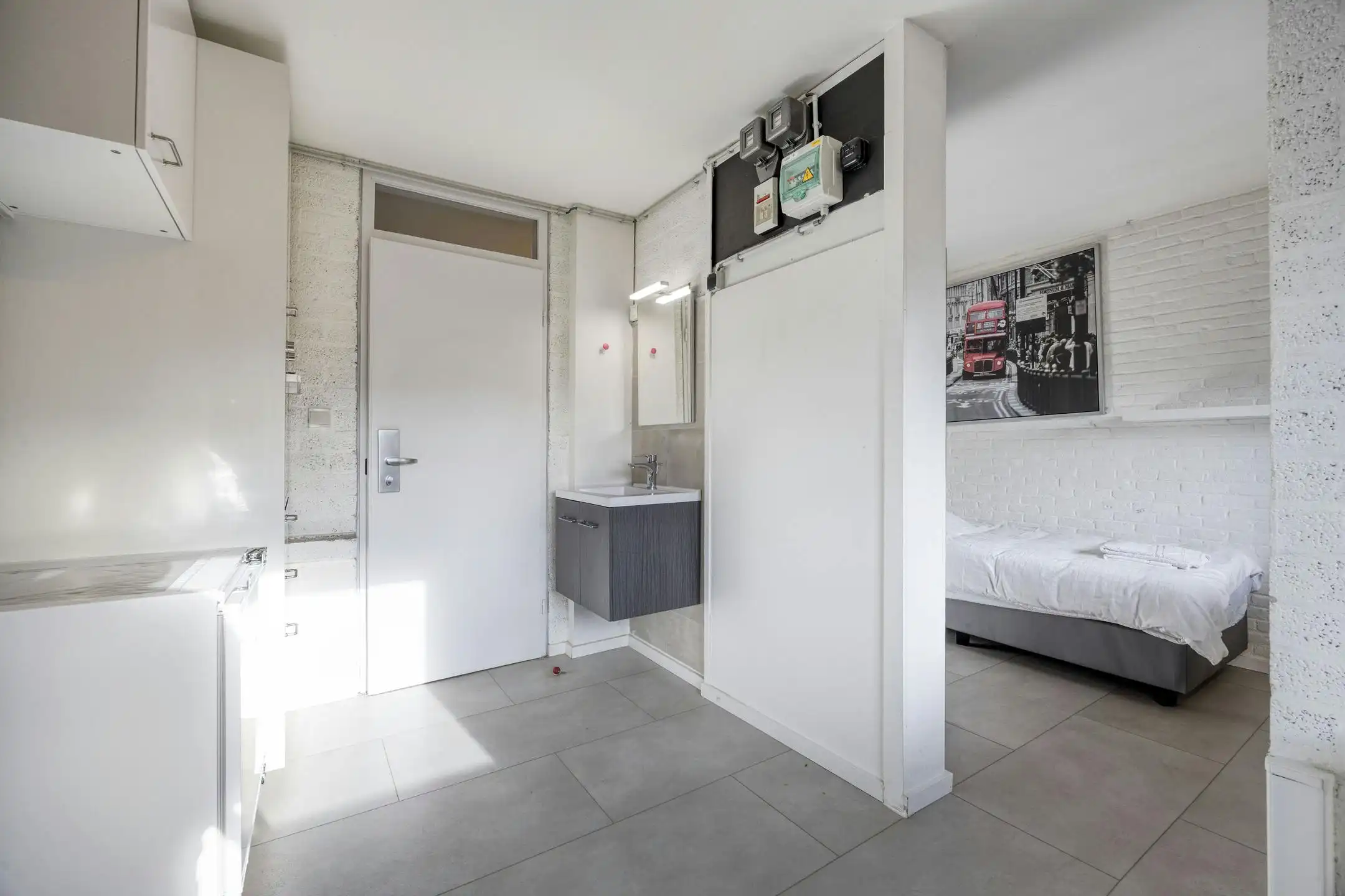 Opbrengsteigendom met 9 studentenkamers en duplex-appartement te Hasselt foto 13