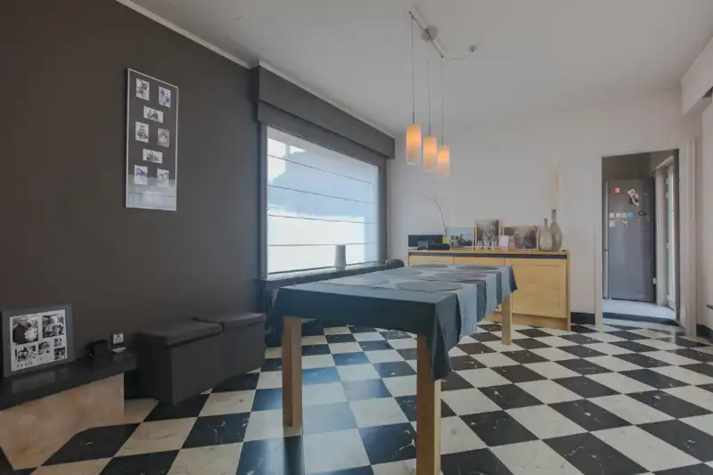 Handelspand (winkel) met woonst en magazijntje van +/- 130m². foto 8