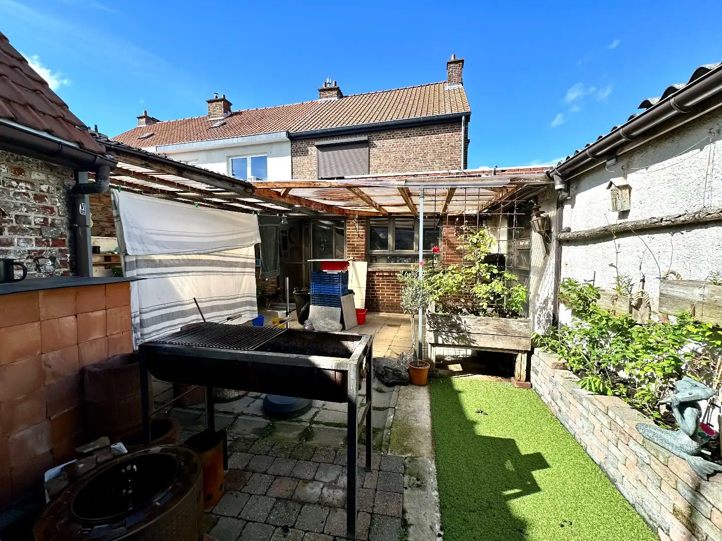 Ruime gezinswoning met 3 slaapkamers, garage en zonnig terras in een rustige buurt van Tongeren foto 8