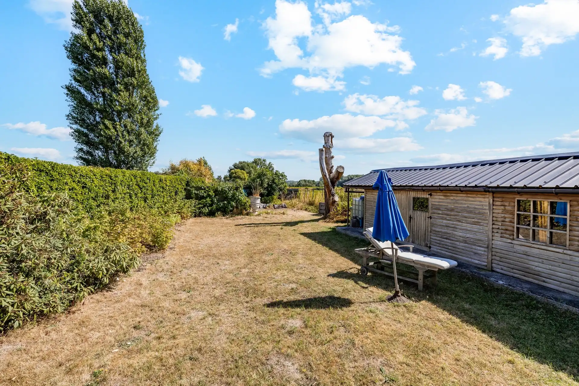 Zeer ruime woning met twee wooneenheden en prachtig landelijk uitzicht foto 32