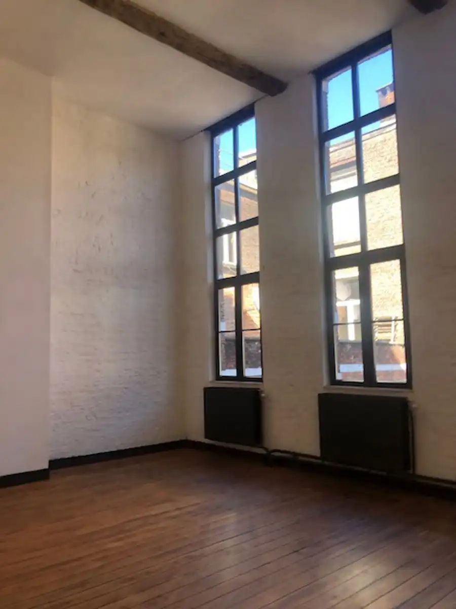 Uniek commercieel gebouw te huur met privatieve stadstuin foto 7