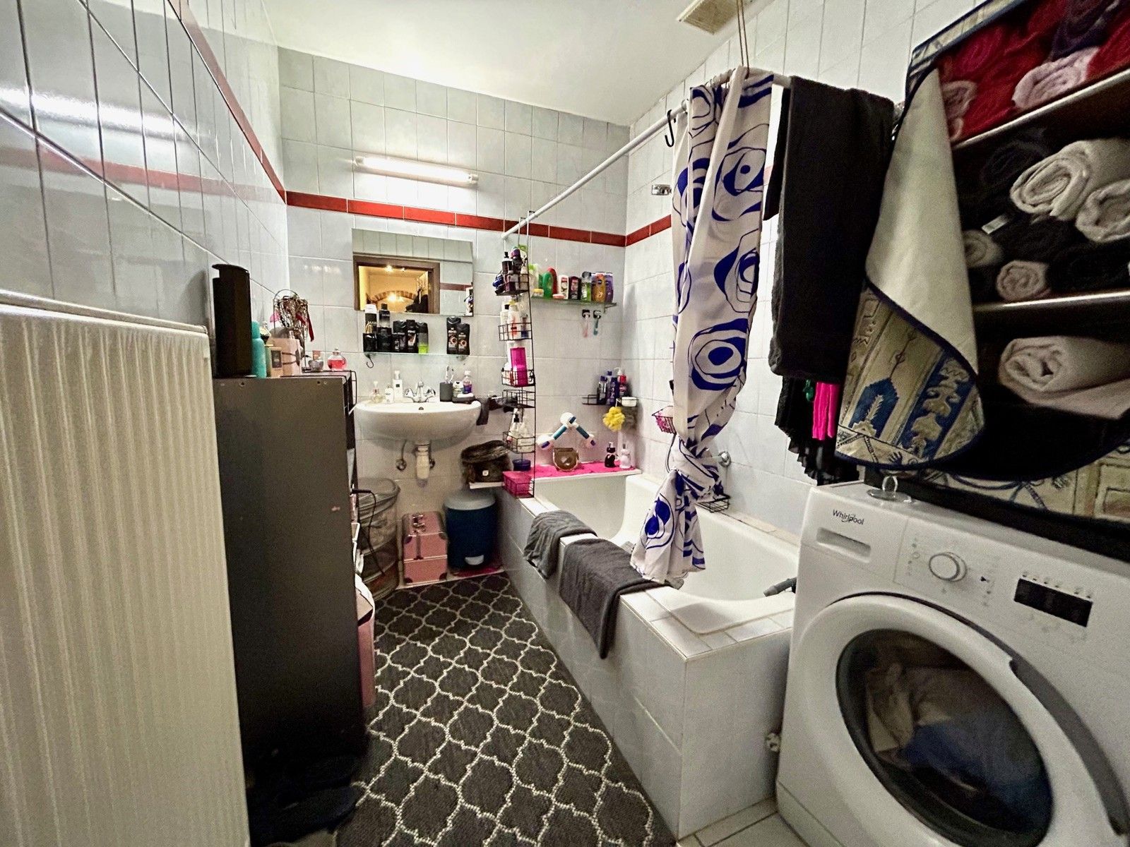 Opbrengsteigendom: handelspand, 2 appartementen en 2 garages foto 25