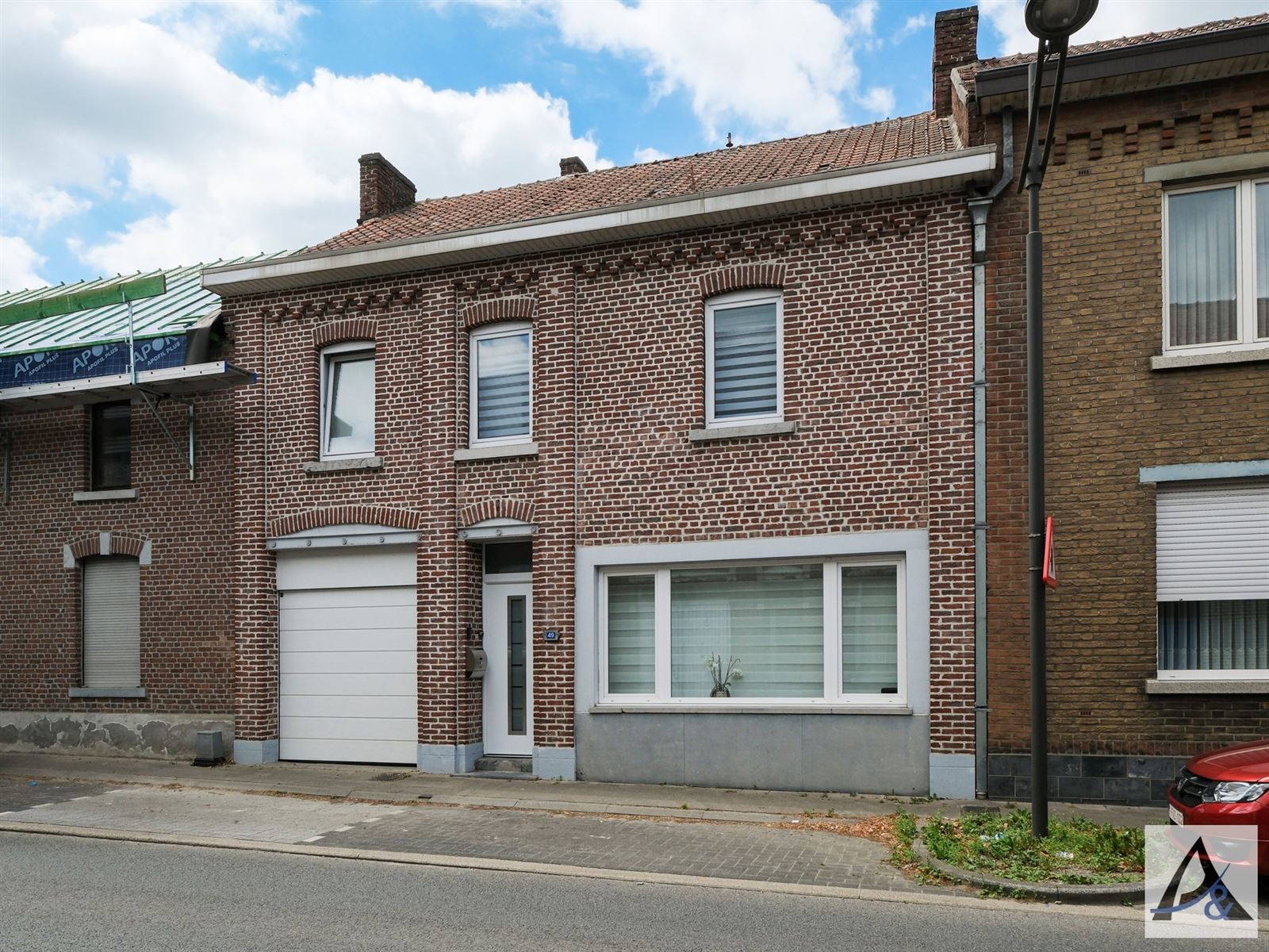 Hoofdfoto van de publicatie: Instapklare gezinswoning met tuin en garage in hartje Munsterbilzen
